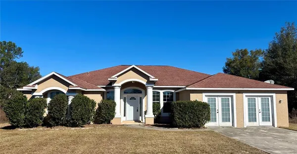 a front view of a house with a porch