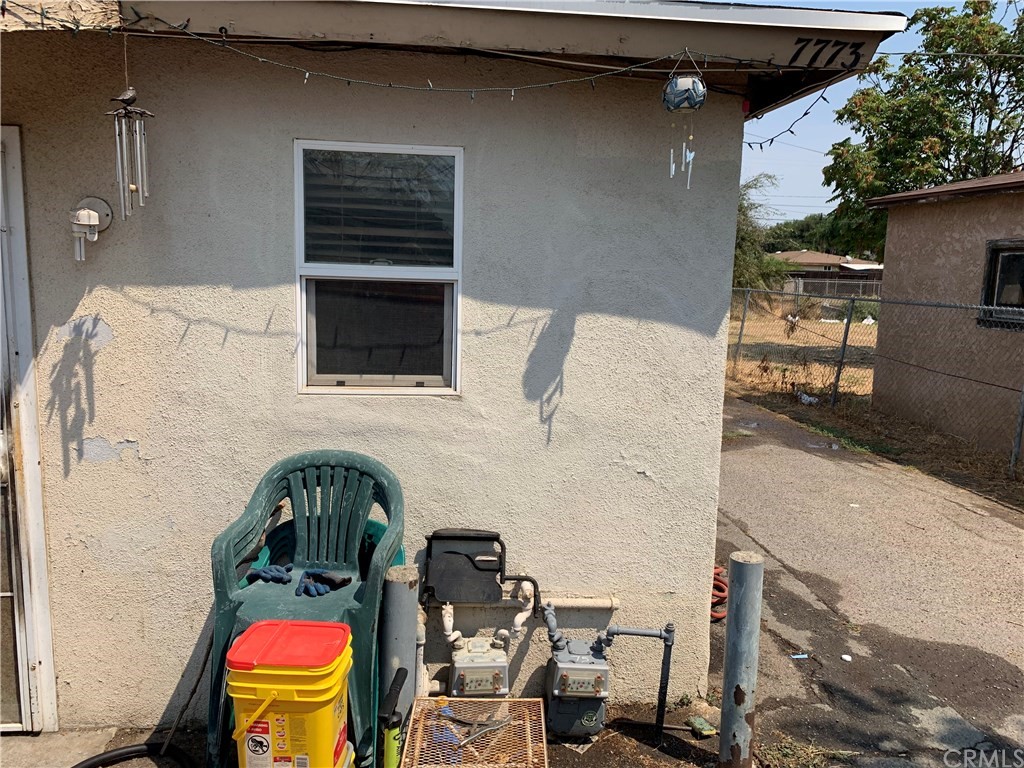 7771 Philbin Avenue Riverside, CA 92503 - Photo 13 of 30 a backyard of a house with seating space