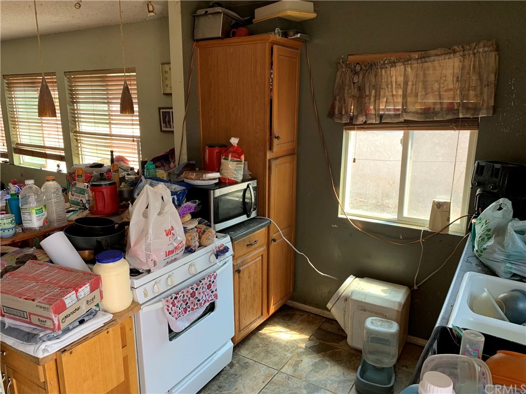 7771 Philbin Avenue Riverside, CA 92503 - Photo 14 of 30 a view of living room with furniture and window
