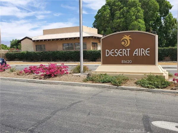 a view of a terrace with seating area