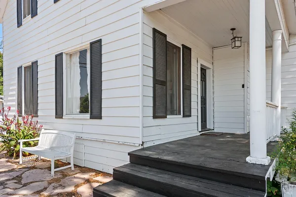 a view of entryway with wooden floor