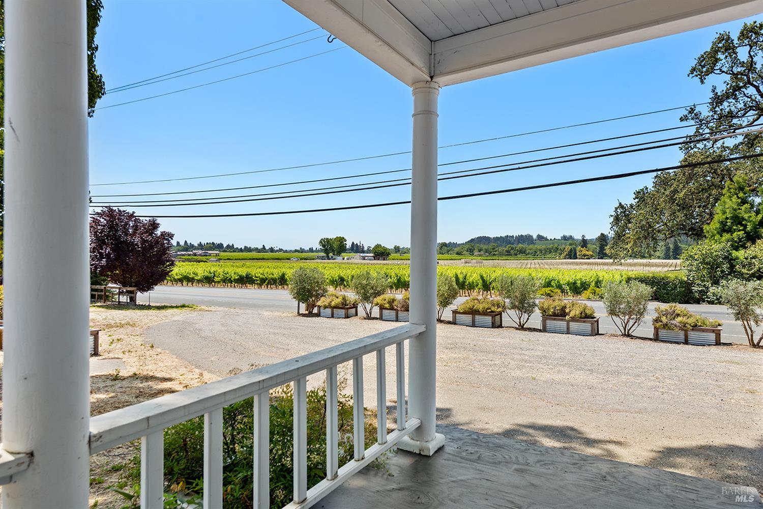 995 Dry Creek Road Healdsburg, CA 95448 - Photo 22 of 57 a view of a street with a car parked on the road