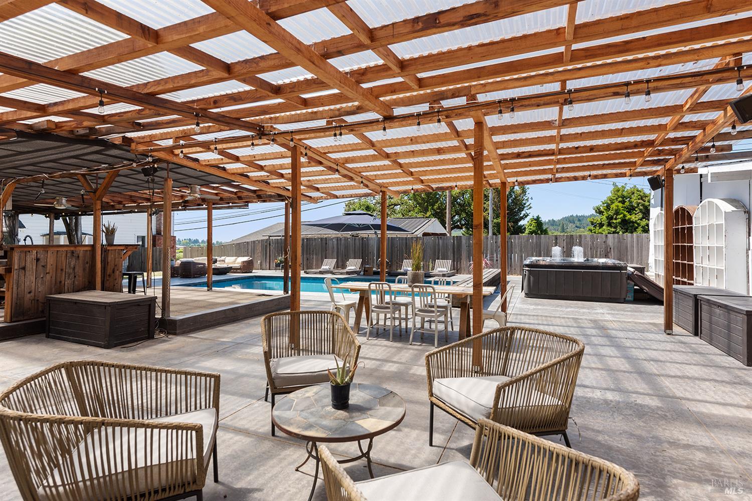 995 Dry Creek Road Healdsburg, CA 95448 - Photo 42 of 57 a outdoor living space with patio furniture and a potted plant