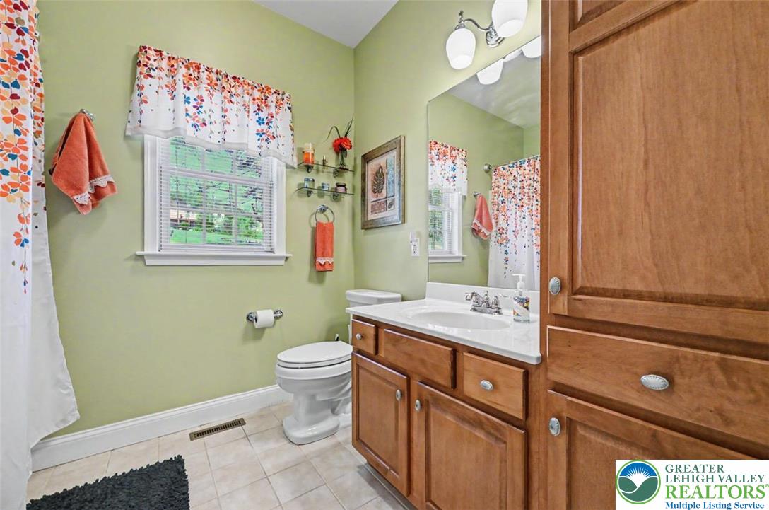 112 Michaels Run Road Stroudsburg, PA 18360 - Photo 29 of 69 The 1st Floor Full Bath has tiled floors, modern lighting, hardware and a window.