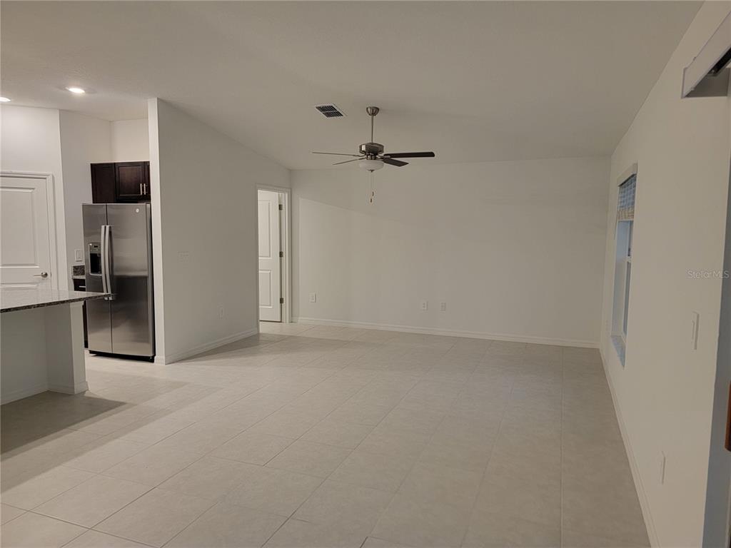 1844 Red Loop Lakeland, FL 33801 - Photo 13 of 24 an empty room with a empty space and windows