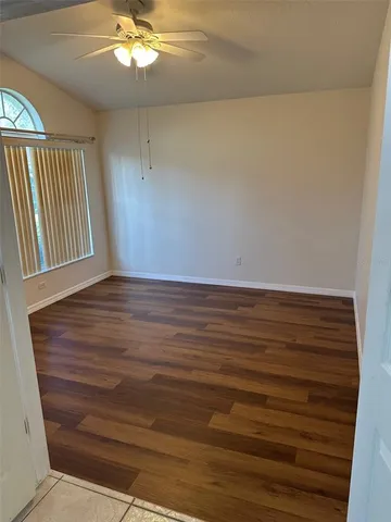 a view of outdoor space with wooden floor and seating space