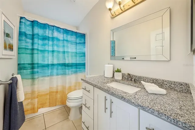 a view of swimming pool having outdoor seating