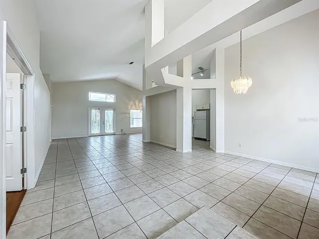 a view of a bathroom with a sink and mirror
