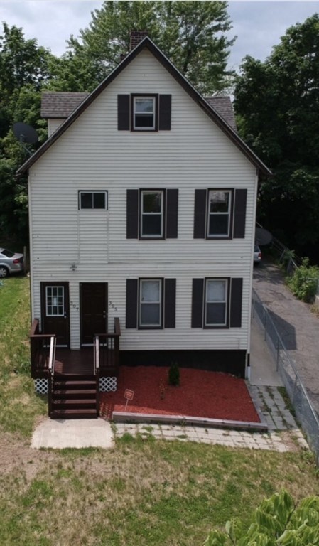 307 Main Street Springfield, MA 01151 - Photo 1 of 1 a view of a house with backyard and garden