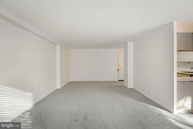 a kitchen with a sink and a stove