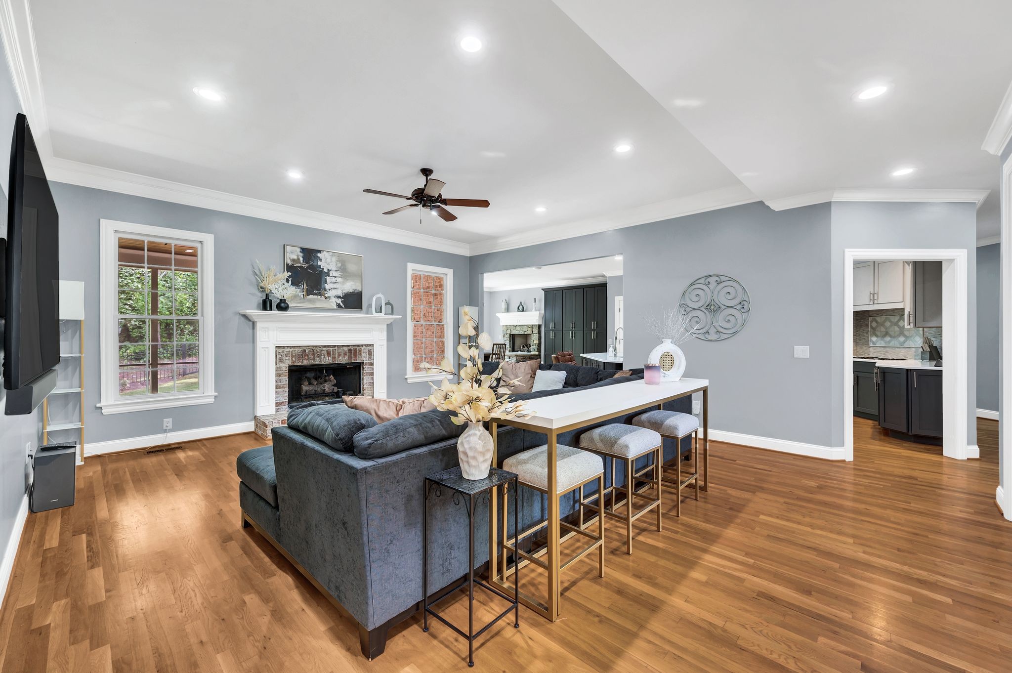 149 Allenhurst Circle Franklin, TN 37067 - Photo 15 of 66 a living room with furniture a fireplace and a flat screen tv