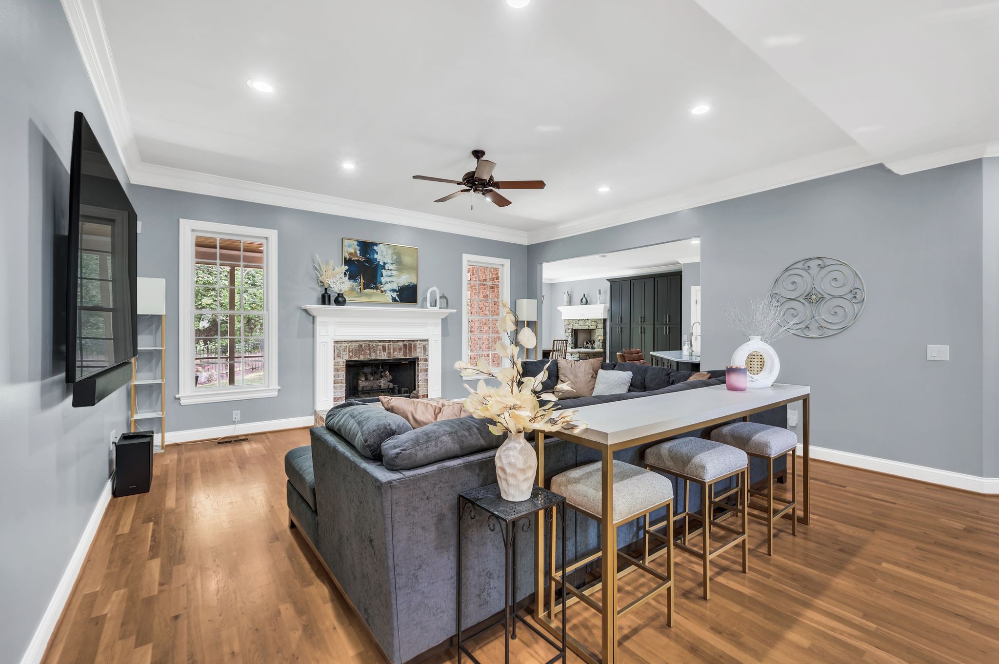 149 Allenhurst Circle Franklin, TN 37067 - Photo 16 of 66 a living room with furniture a fireplace and a flat screen tv