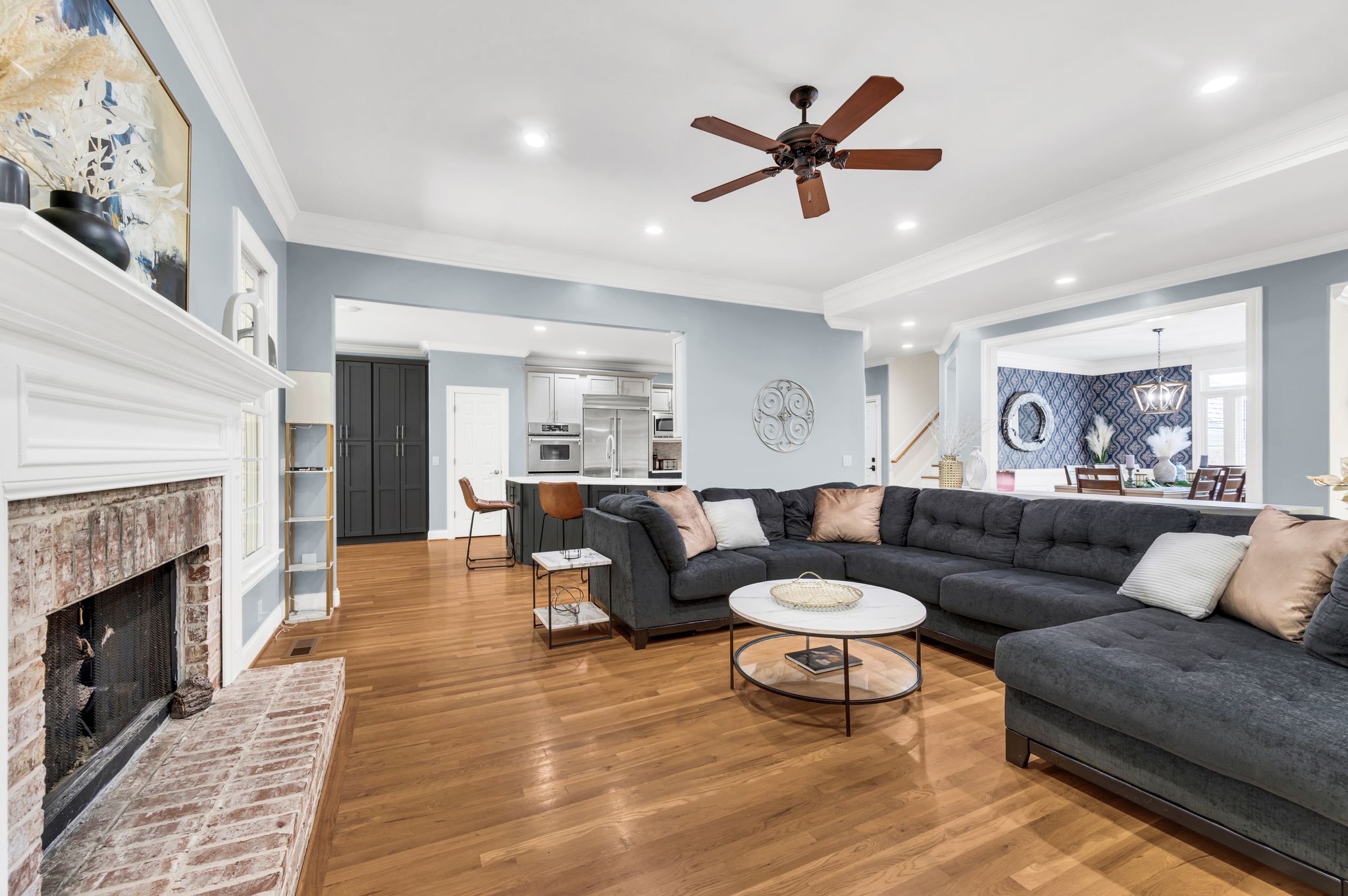 149 Allenhurst Circle Franklin, TN 37067 - Photo 18 of 66 a living room with furniture and a fireplace
