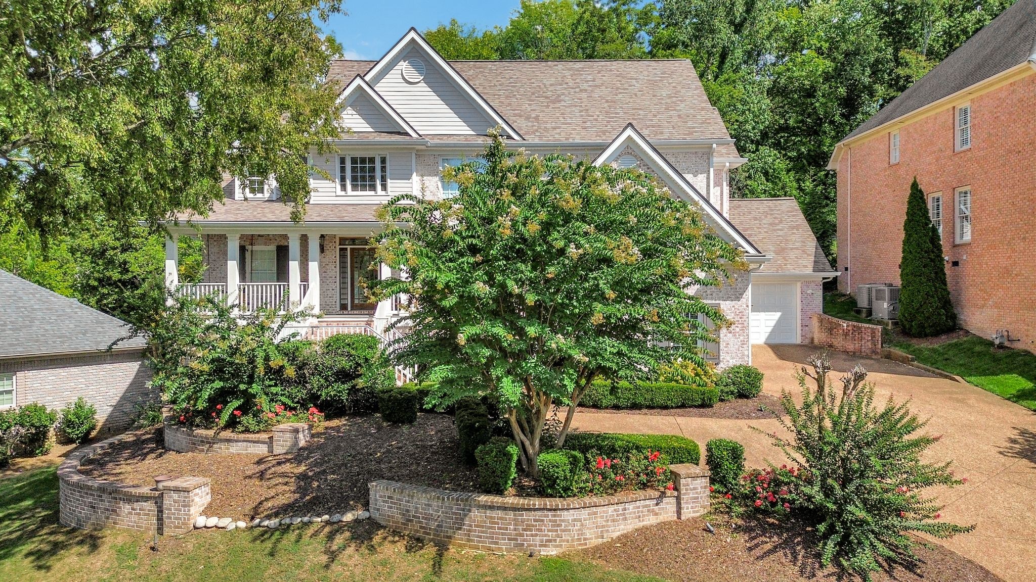 149 Allenhurst Circle Franklin, TN 37067 - Photo 2 of 66 a view of a house with a yard and plants