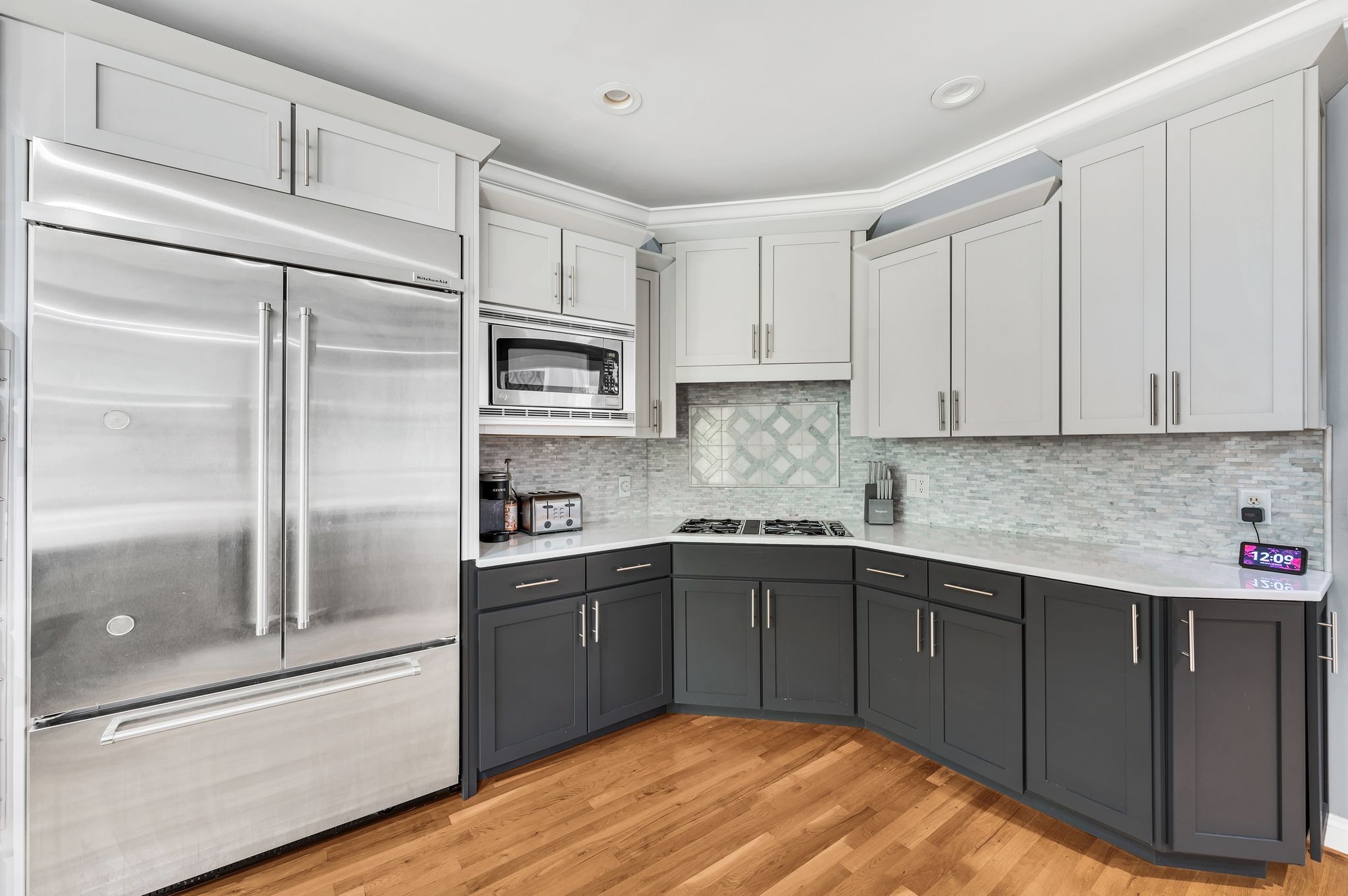 149 Allenhurst Circle Franklin, TN 37067 - Photo 24 of 66 a kitchen with stainless steel appliances granite countertop a refrigerator sink and cabinets