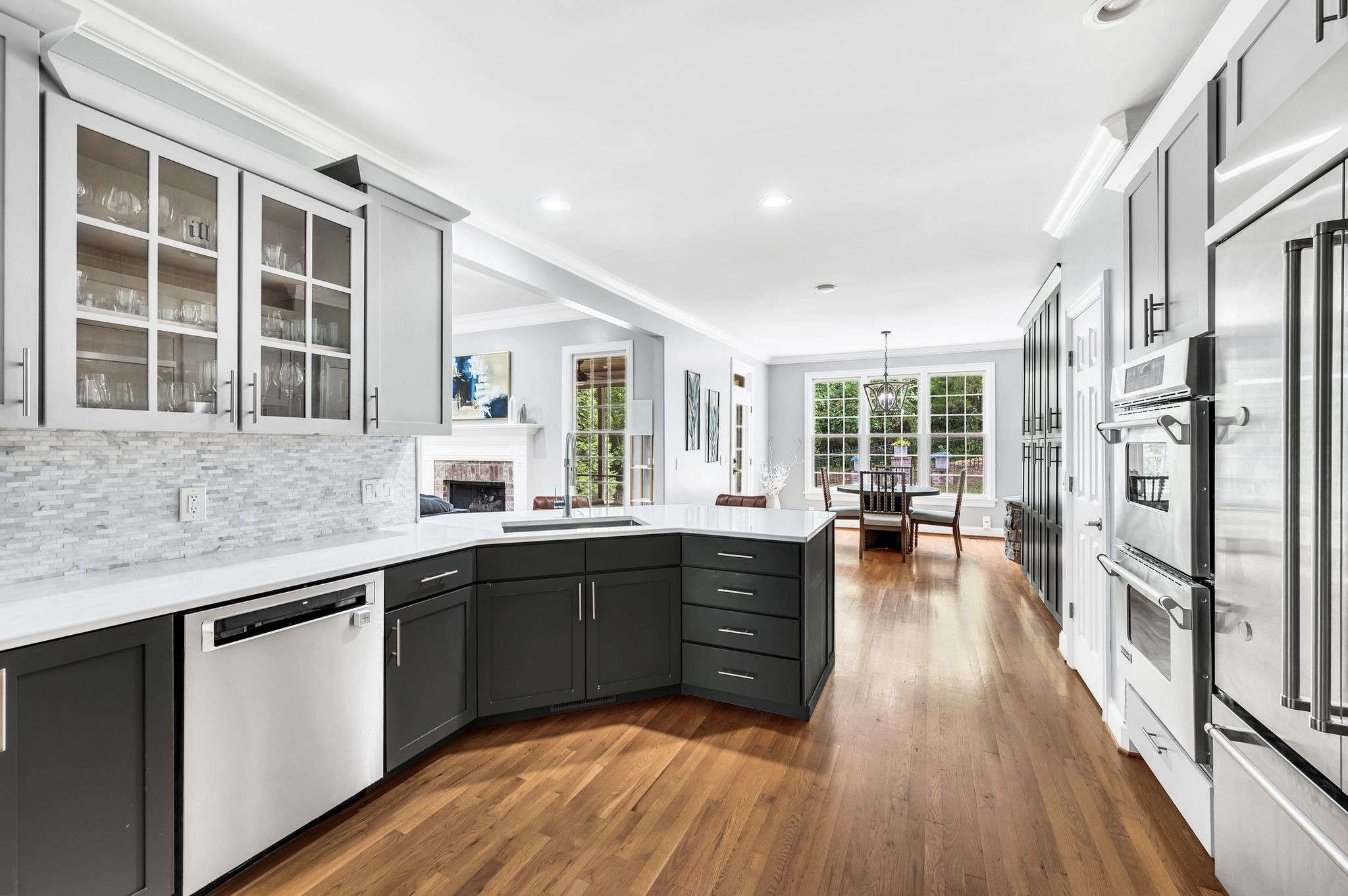 149 Allenhurst Circle Franklin, TN 37067 - Photo 25 of 66 a kitchen with stainless steel appliances granite countertop a stove and cabinets
