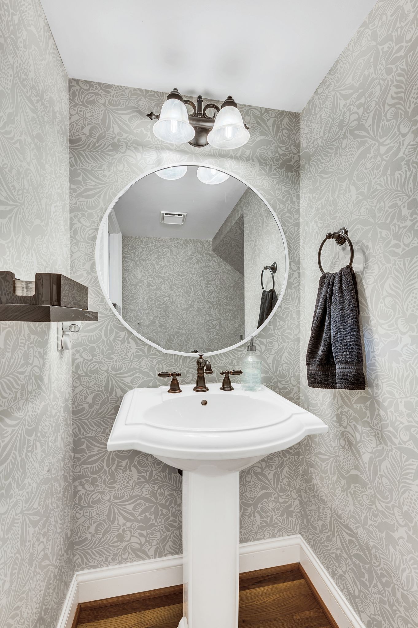 149 Allenhurst Circle Franklin, TN 37067 - Photo 29 of 66 a bathroom with a sink and a mirror