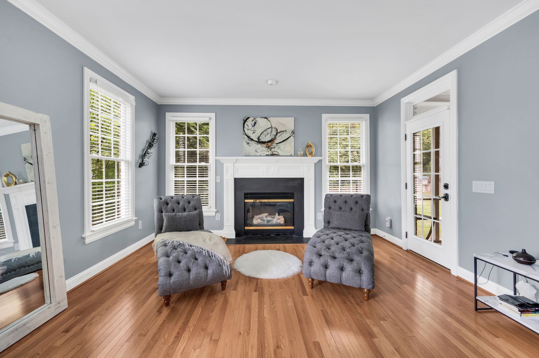 149 Allenhurst Circle Franklin, TN 37067 - Photo 32 of 66 a living room with furniture and a fireplace