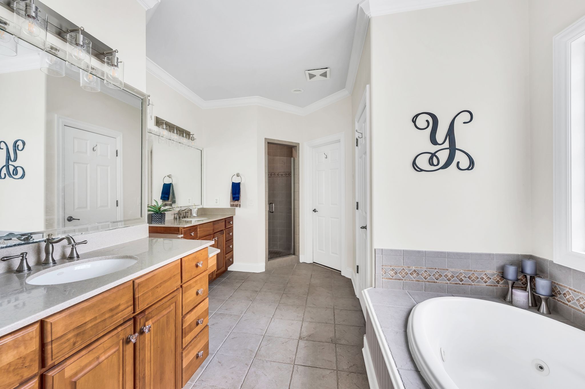 149 Allenhurst Circle Franklin, TN 37067 - Photo 34 of 66 a bathroom with a sink and a mirror