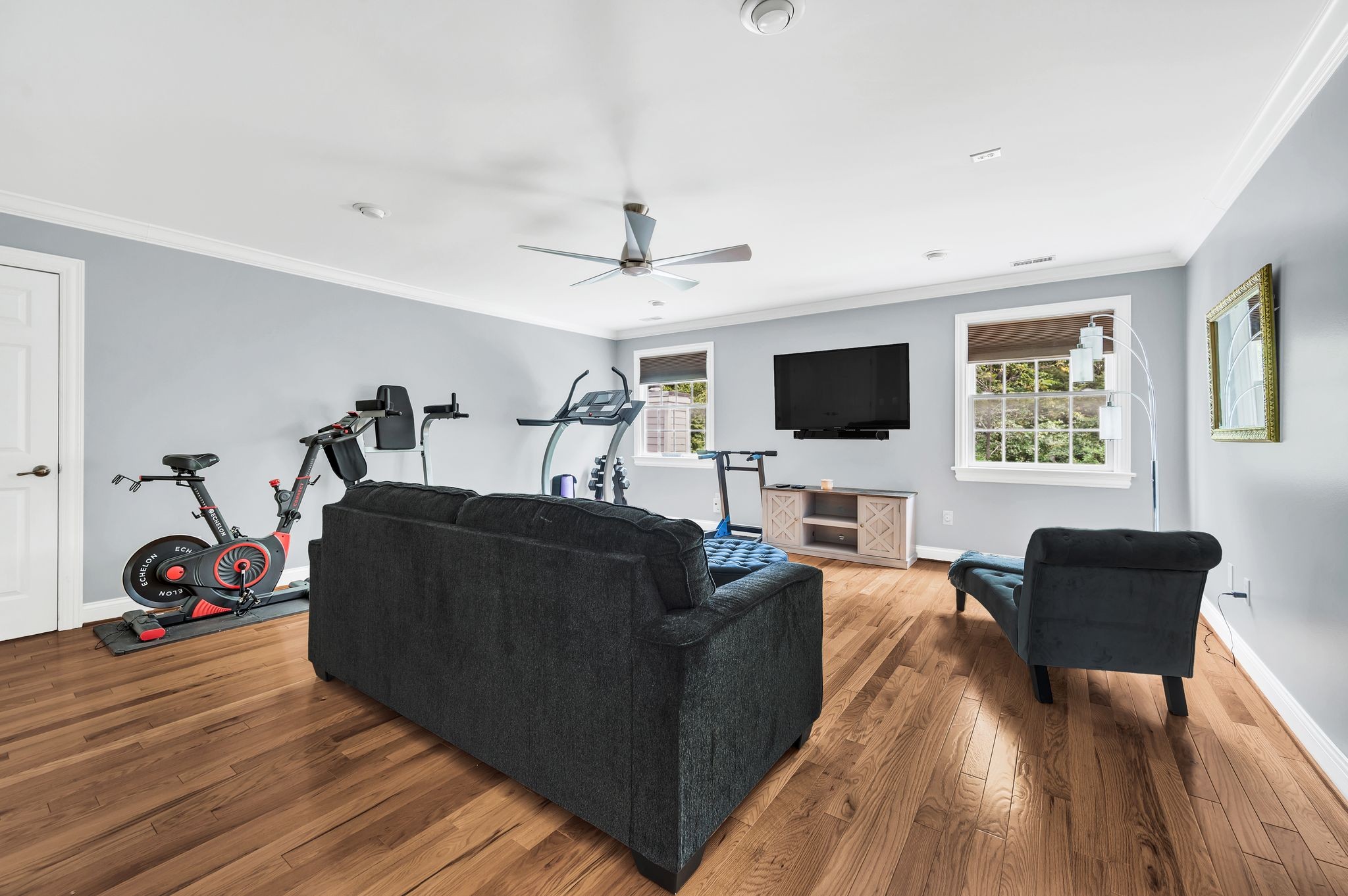 149 Allenhurst Circle Franklin, TN 37067 - Photo 46 of 66 a living room with furniture and a flat screen tv