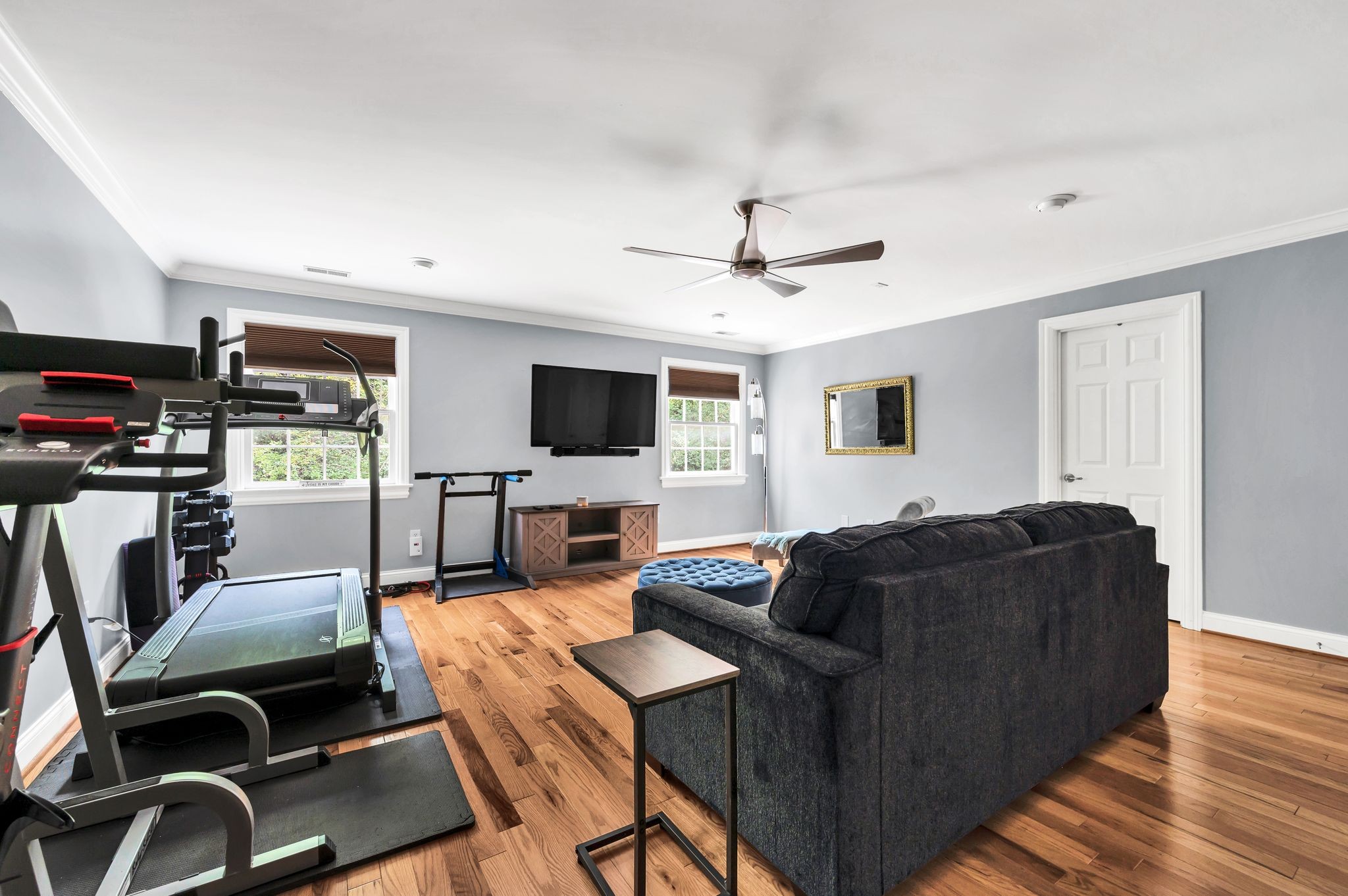 149 Allenhurst Circle Franklin, TN 37067 - Photo 47 of 66 a living room with furniture and a flat screen tv