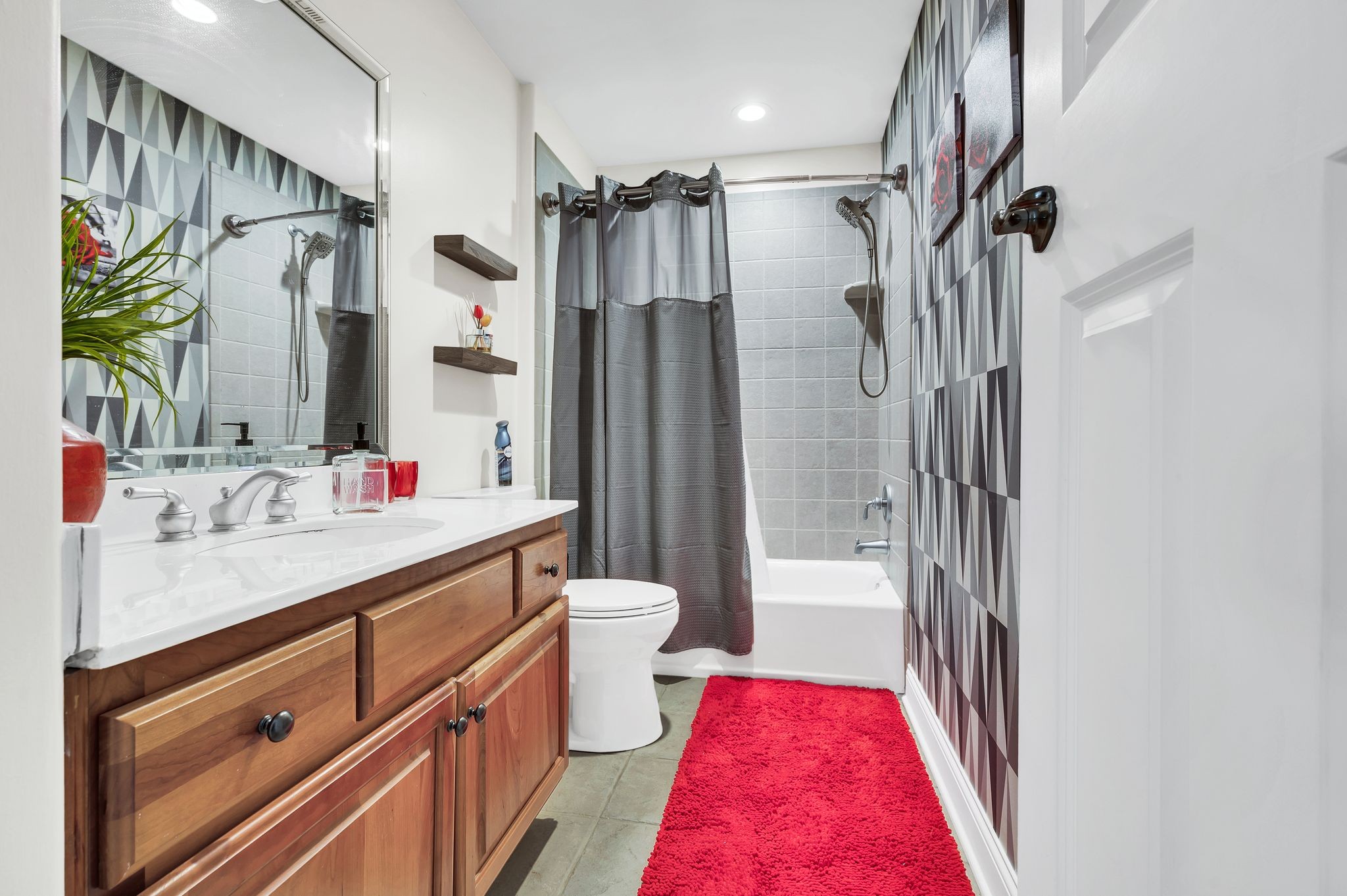 149 Allenhurst Circle Franklin, TN 37067 - Photo 49 of 66 a bathroom with a double vanity sink toilet and shower