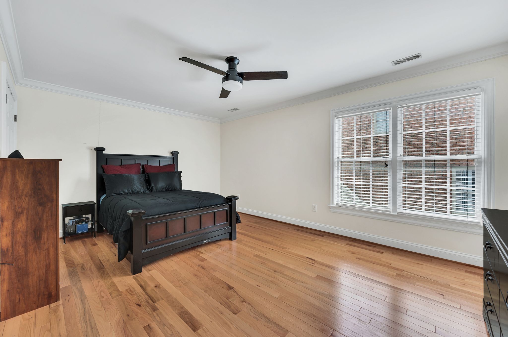 149 Allenhurst Circle Franklin, TN 37067 - Photo 50 of 66 a bedroom with furniture and wooden floor