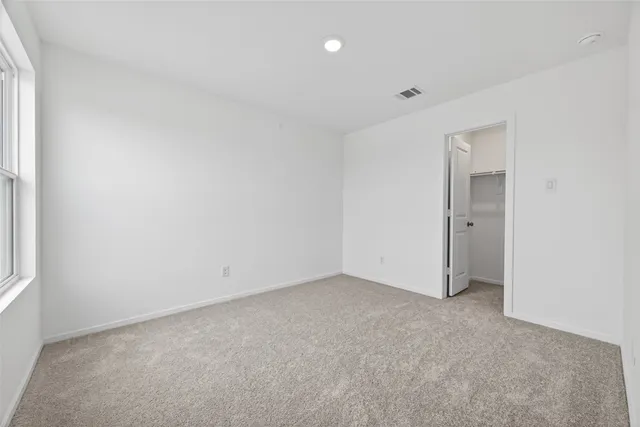 an empty room with a natural light