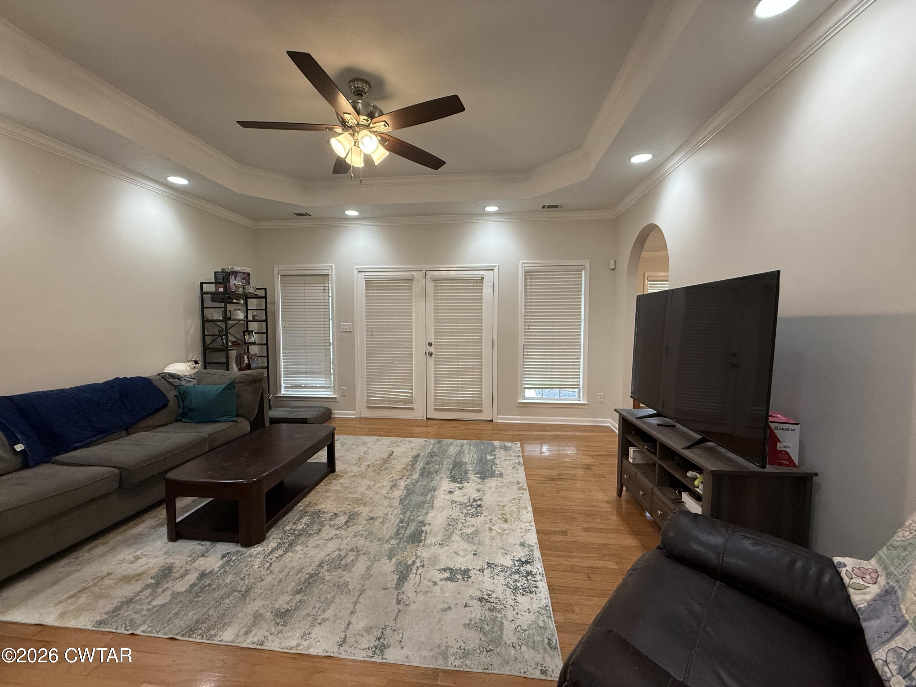 126 Waldunn Cove Rutherford, TN 38369 - Photo 5 of 18 a living room with furniture and a flat screen tv