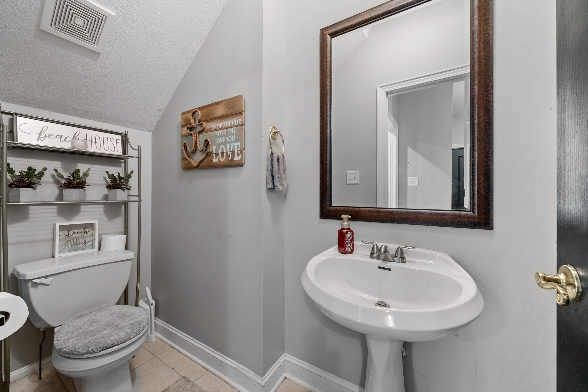 3723 Reed Road Indian Mound, TN 37079 - Photo 21 of 47 a bathroom with a sink toilet and mirror