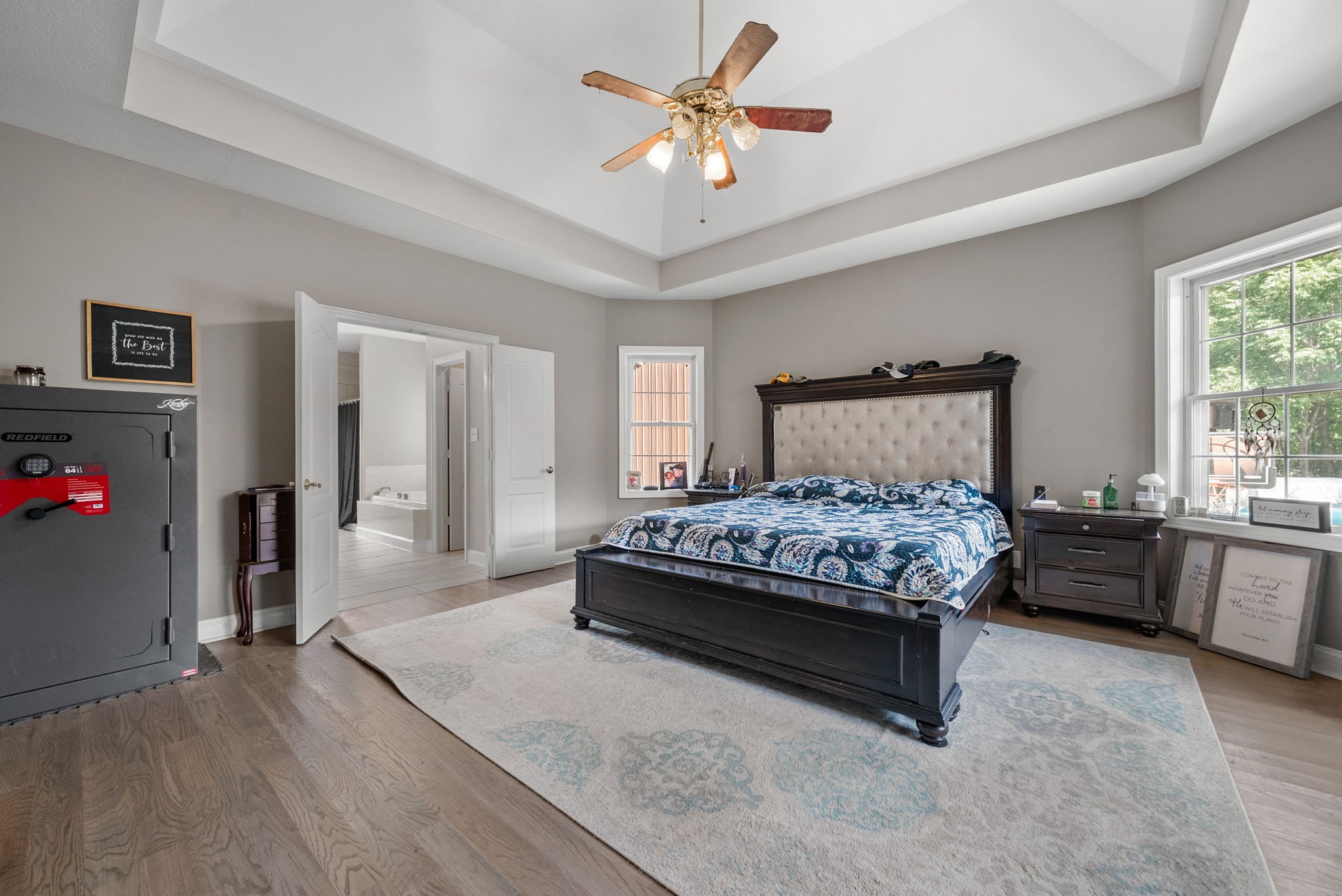 3723 Reed Road Indian Mound, TN 37079 - Photo 22 of 47 a bedroom with a bed and a chandelier