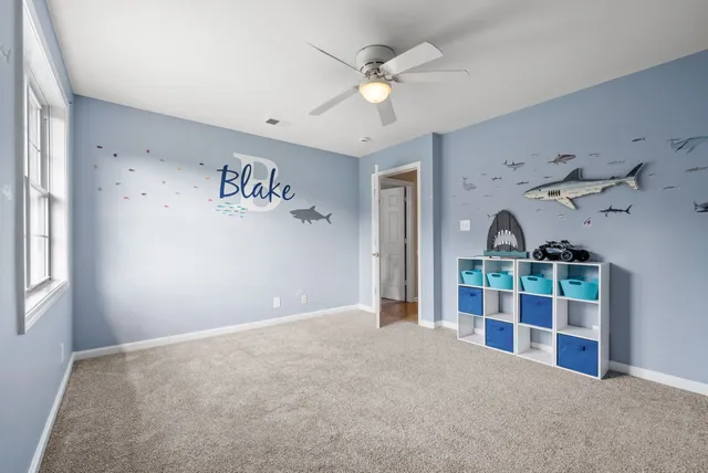 a view of a livingroom with a staircase