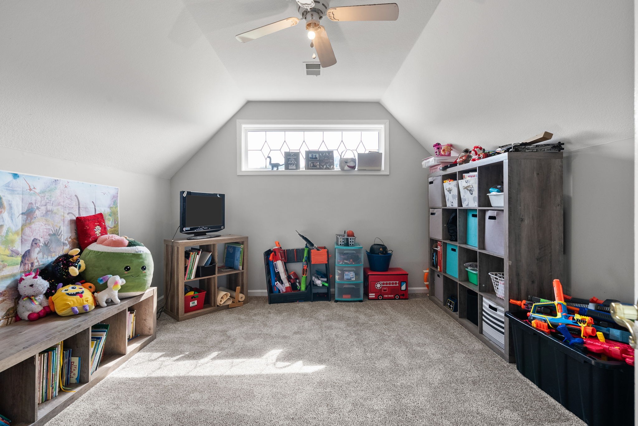 3723 Reed Road Indian Mound, TN 37079 - Photo 38 of 47 a children room with toys and a flat screen tv