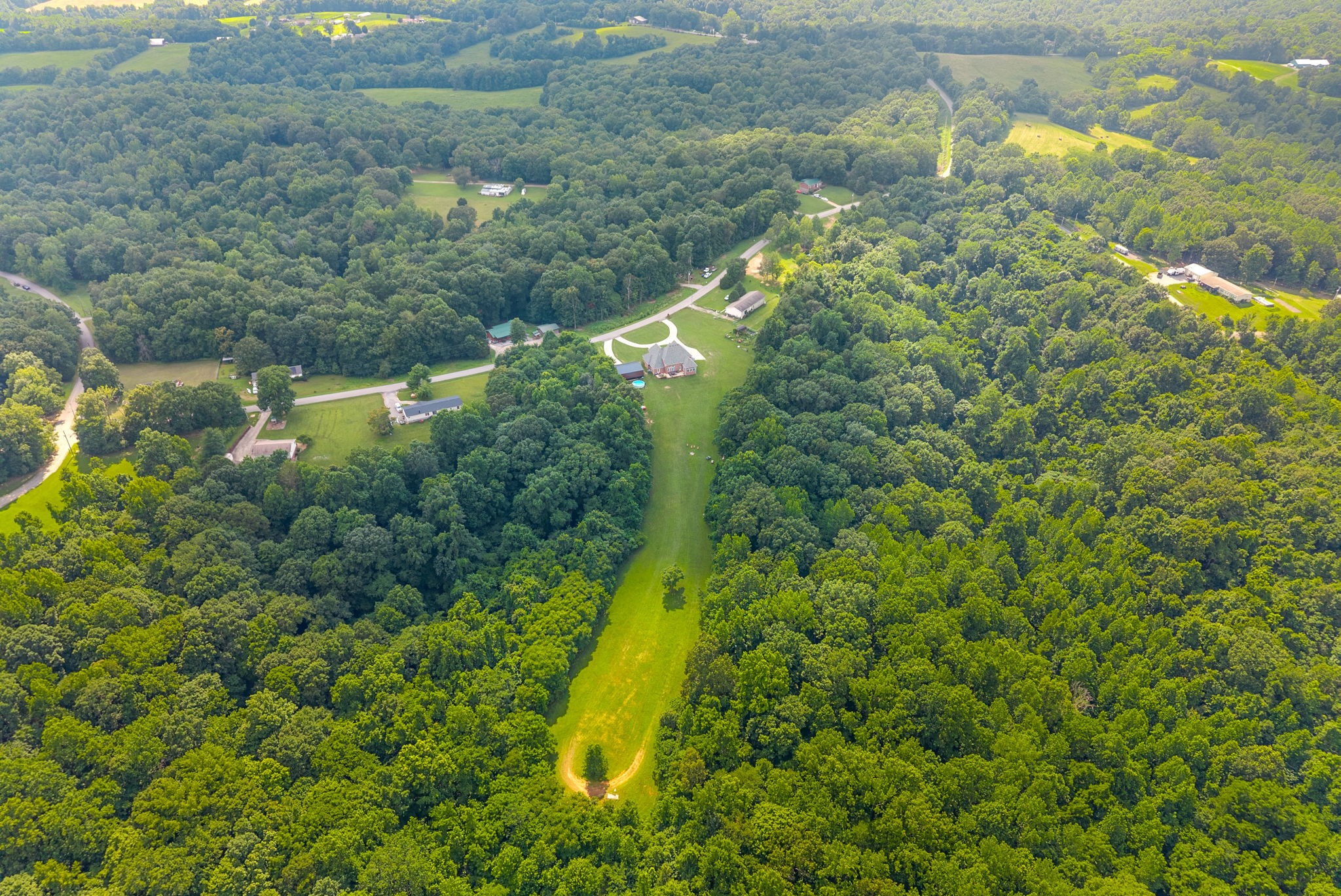 3723 Reed Road Indian Mound, TN 37079 - Photo 46 of 47 a view of a forest with a houses