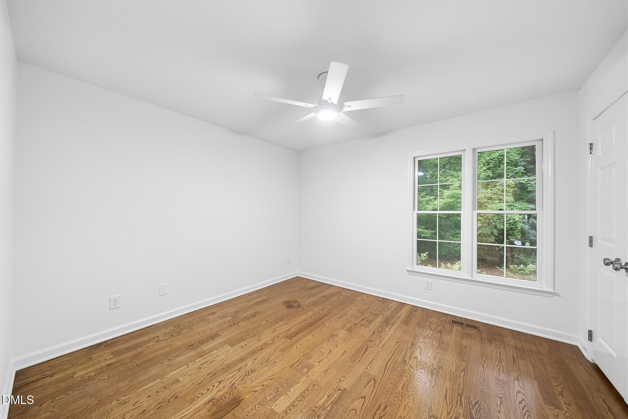 3404 Timberwood Court Raleigh, NC 27606 - Photo 18 of 45 an empty room with a window