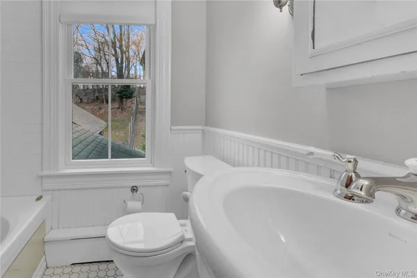a bathroom with a sink and a toilet