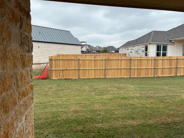 a view of a house with a garden