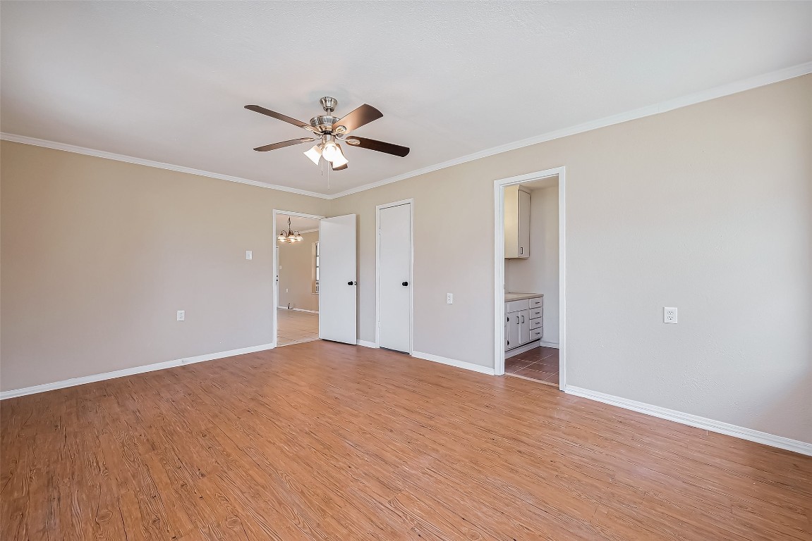 14 Veronica Lane Huntsville, TX 77340 - Photo 25 of 50 a view of an empty room with a window and a ceiling fan