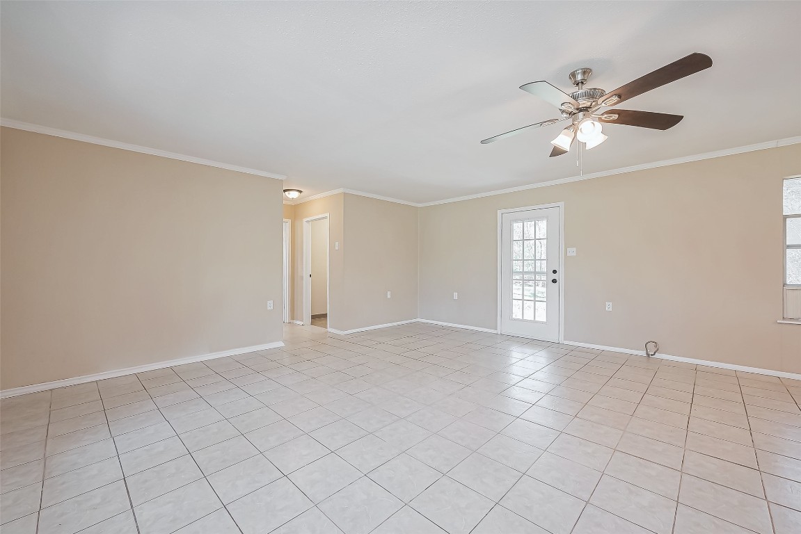 14 Veronica Lane Huntsville, TX 77340 - Photo 4 of 50 a view of an empty room with a window