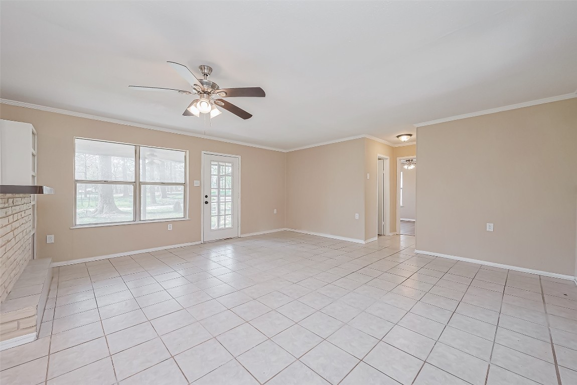 14 Veronica Lane Huntsville, TX 77340 - Photo 6 of 50 wooden floor in an empty room with a window