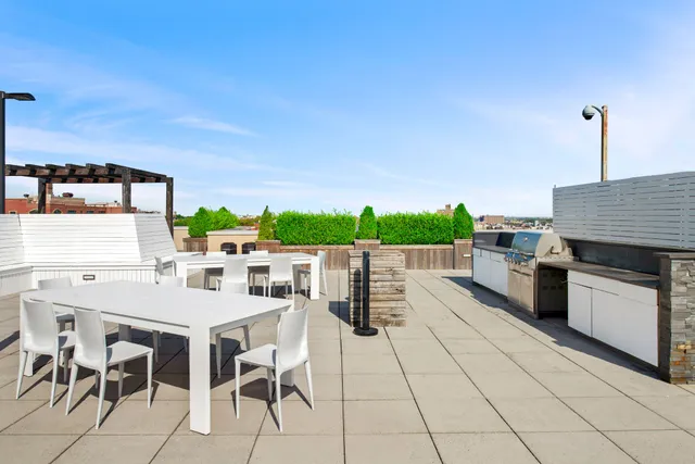 a view of a terrace with furniture