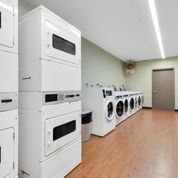 301 Sullivan Place, Unit 4Q Brooklyn, NY 11225 - Photo 25 of 27 a white stove top oven sitting inside of a kitchen