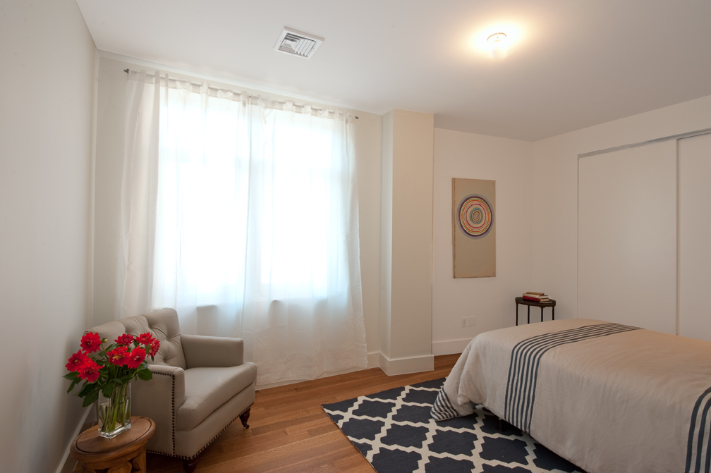 301 Sullivan Place, Unit 4Q Brooklyn, NY 11225 - Photo 5 of 27 a bedroom with a bed and a window