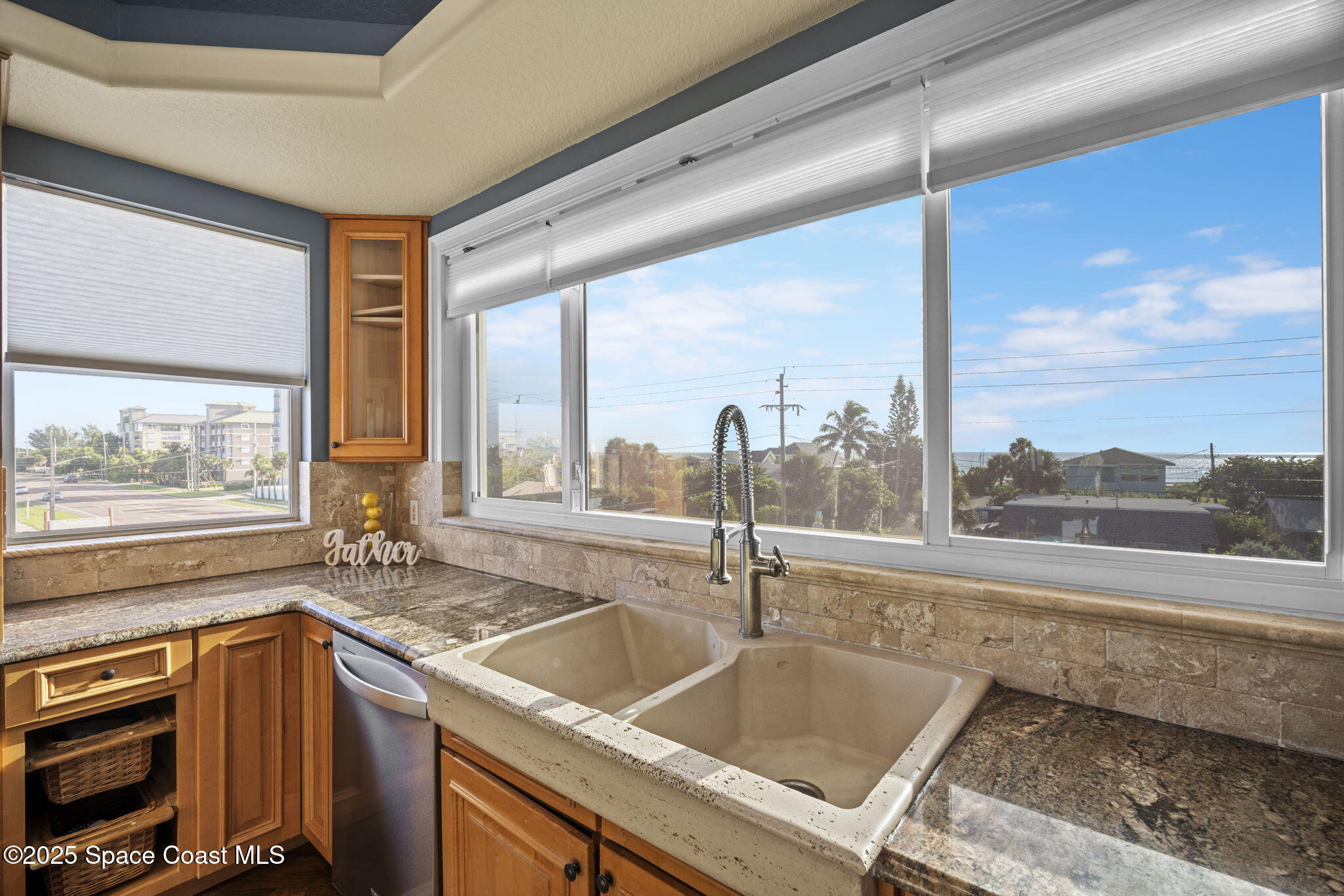 2694 South Atlantic Avenue Cocoa Beach, FL 32931 - Photo 15 of 72 a kitchen with a sink and a window