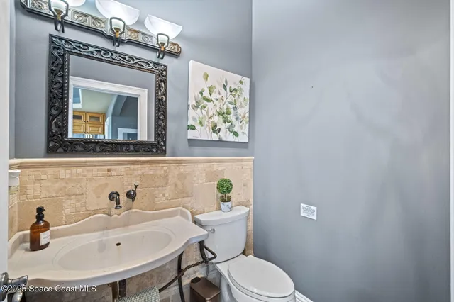 a view of a balcony with furniture