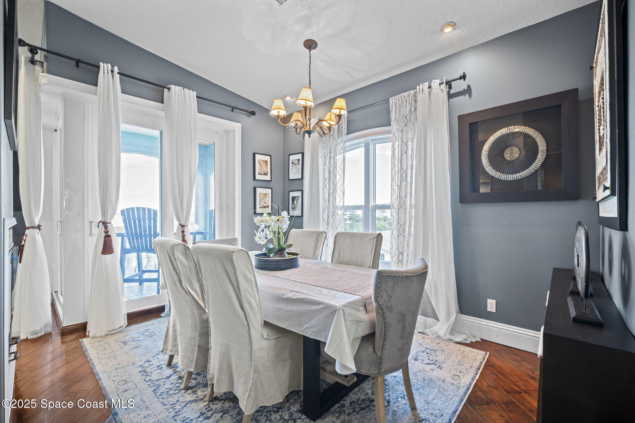2694 South Atlantic Avenue Cocoa Beach, FL 32931 - Photo 22 of 72 a view of a dining room with furniture window and outside view