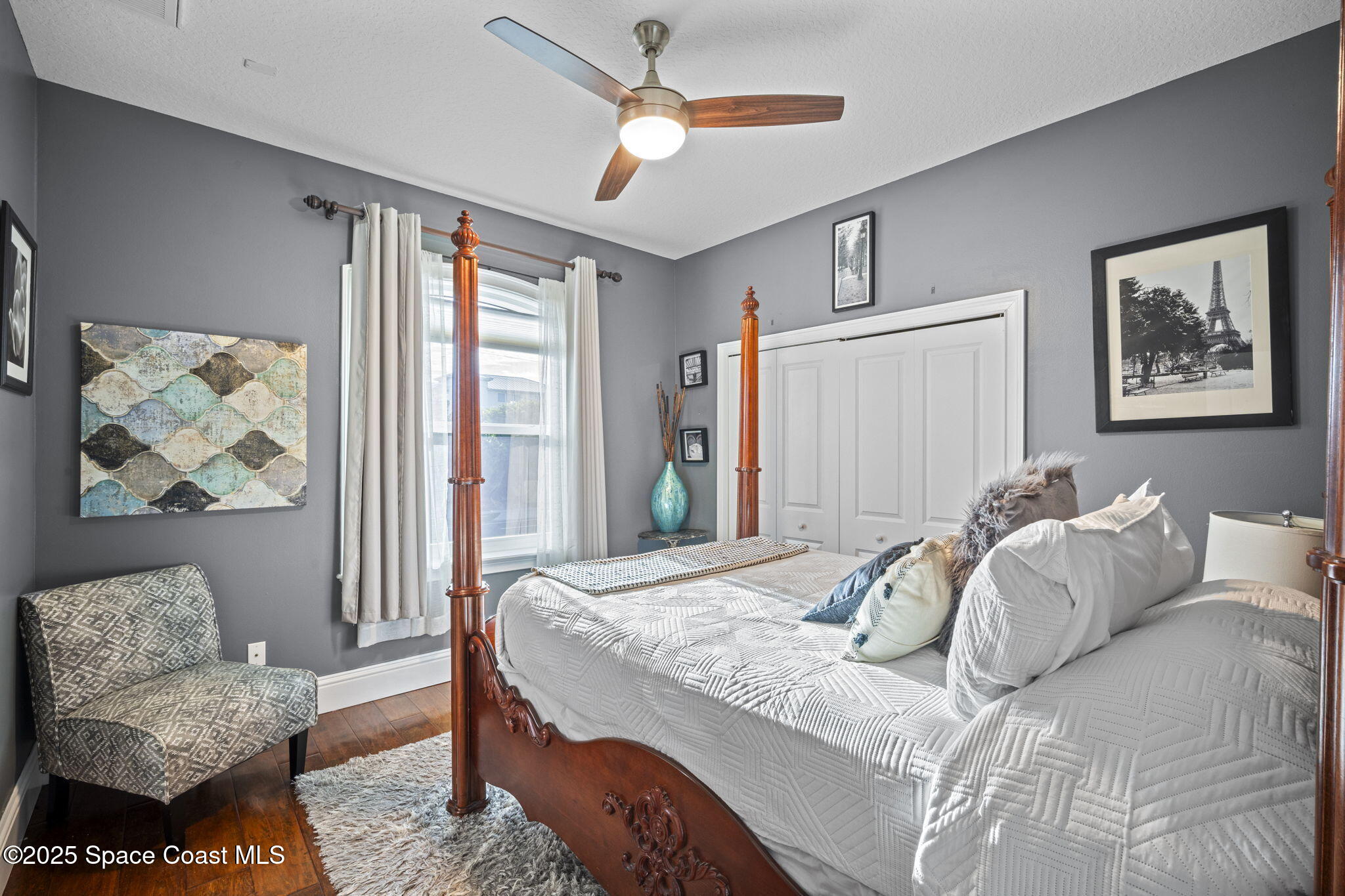 2694 South Atlantic Avenue Cocoa Beach, FL 32931 - Photo 34 of 72 a bedroom with a bed and a couch