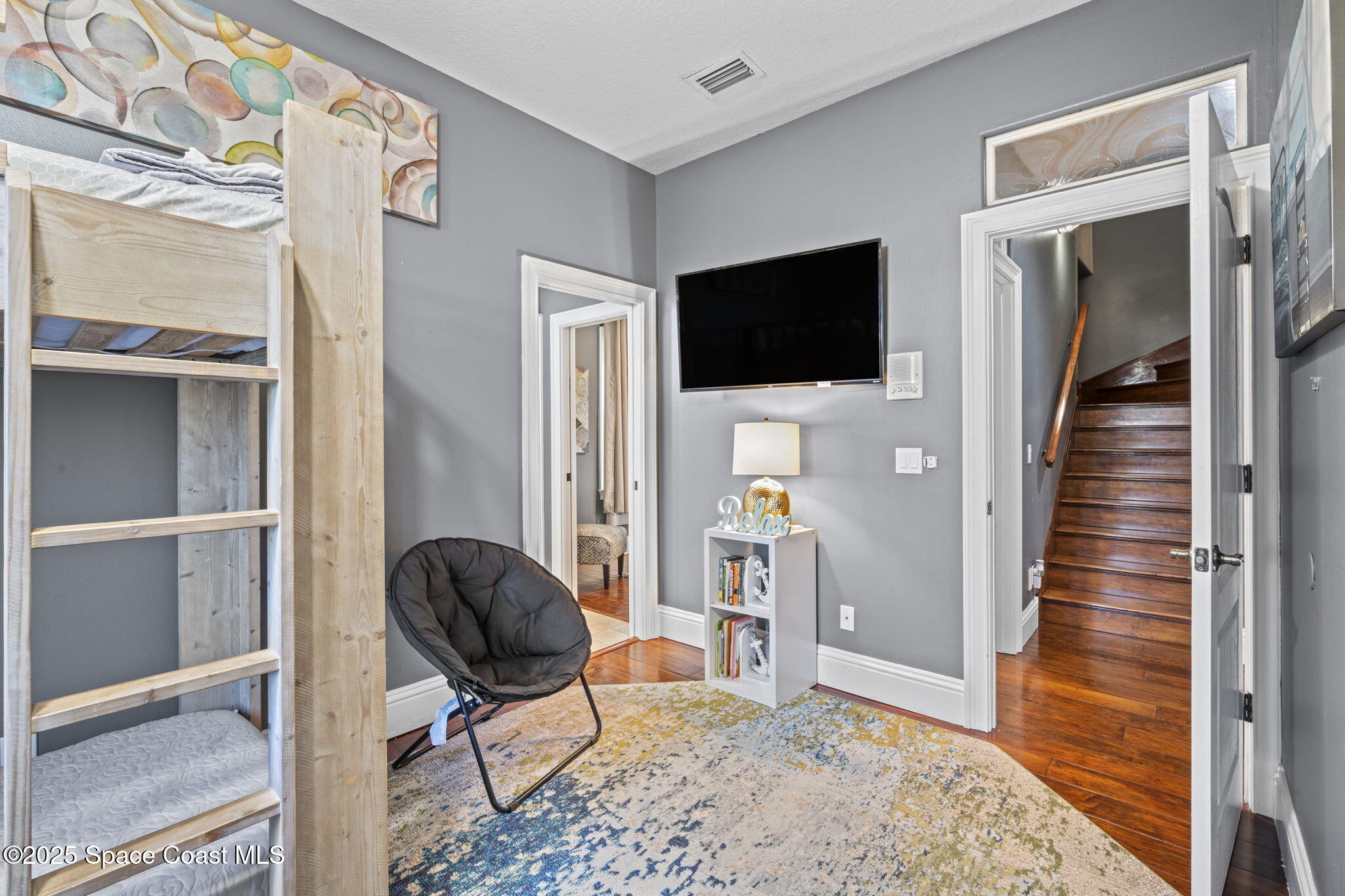 2694 South Atlantic Avenue Cocoa Beach, FL 32931 - Photo 37 of 72 a view of a livingroom with workspace and a window