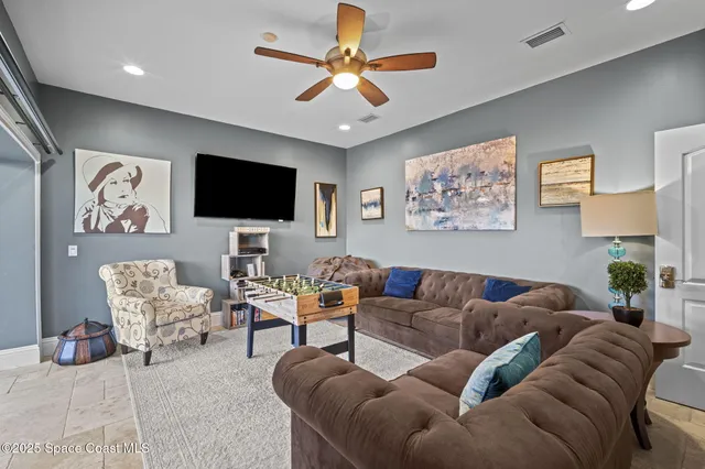 a view of a chairs and table in the patio