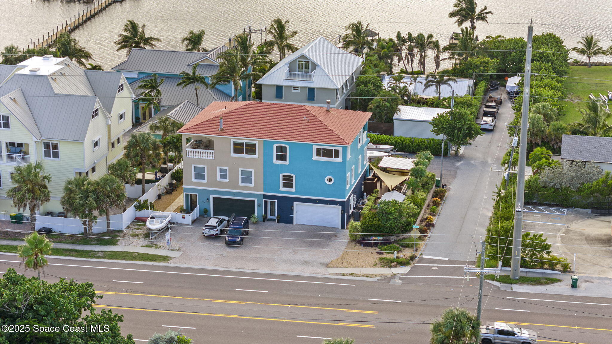 2694 South Atlantic Avenue Cocoa Beach, FL 32931 - Photo 60 of 72 an aerial view of multiple houses with a street